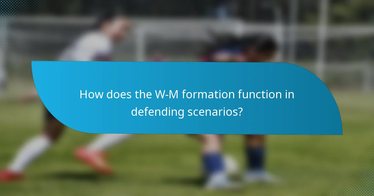 How does the W-M formation function in defending scenarios?